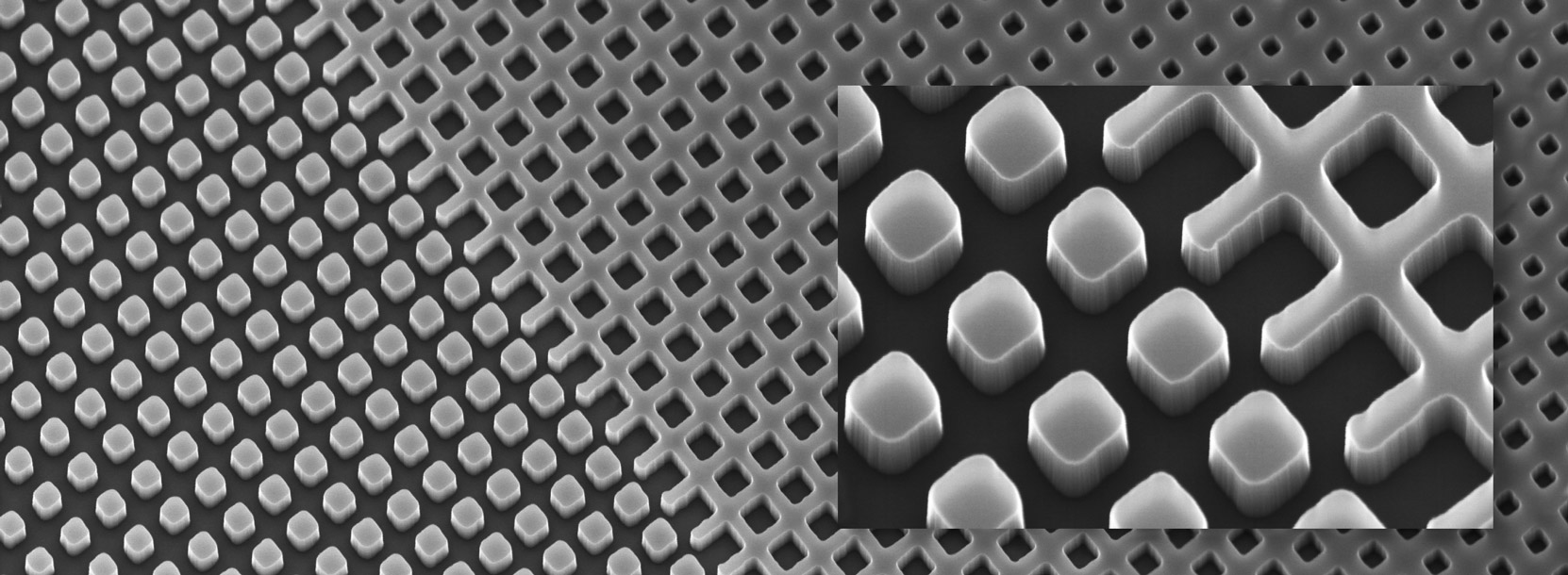 SEM image of a grating structure with two different kinds of sub-wavelength entities, i.e. pillars and voids.