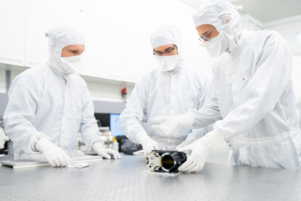 Group picture of the developers of the reflecting telescope.