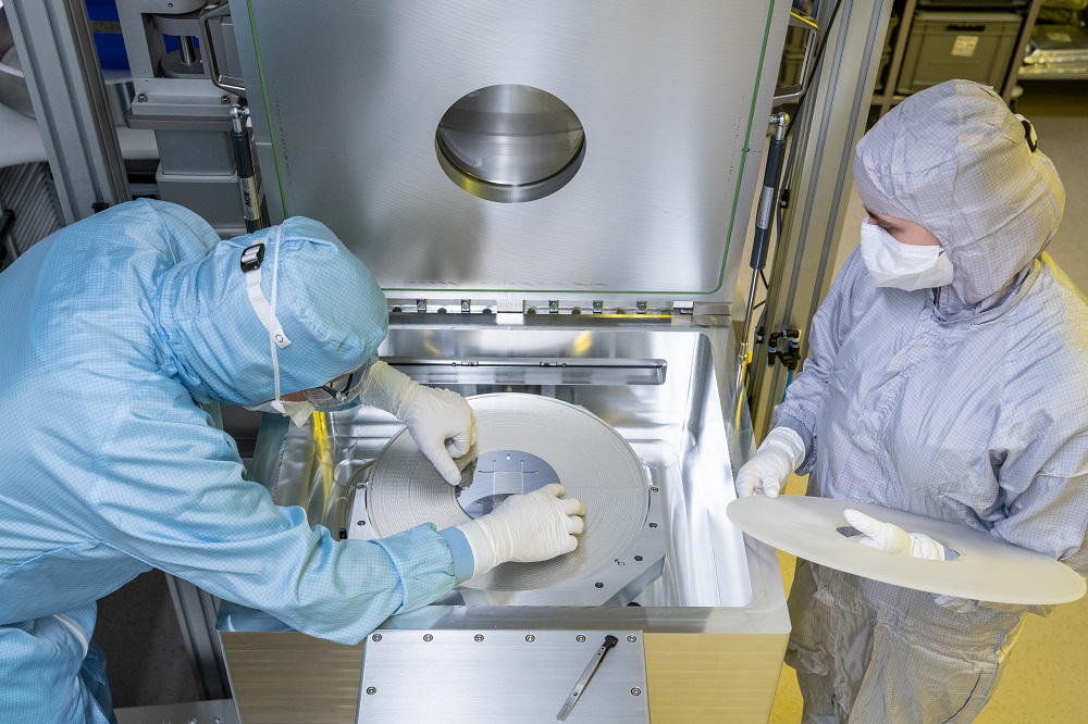 Researchers prepare the diamond for the etching process. 