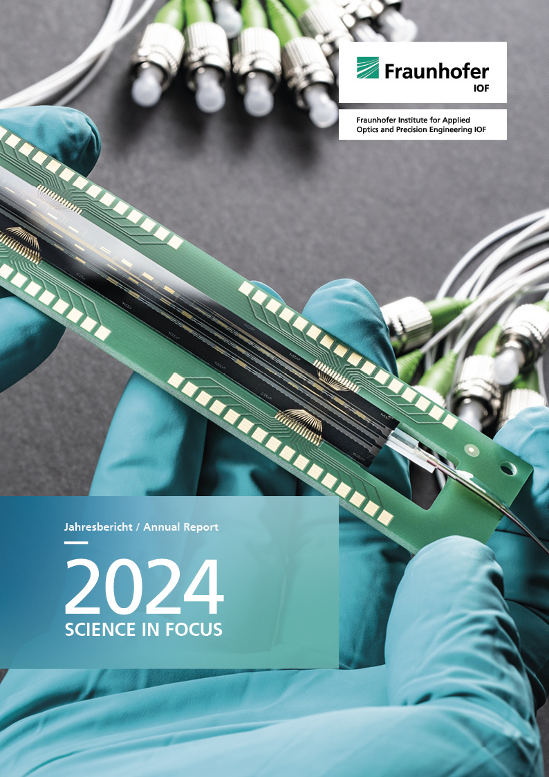 Cover of the Fraunhofer IOF Annual report 2022 Close-up of a space spectrometer developed by Fraunhofer IOF.