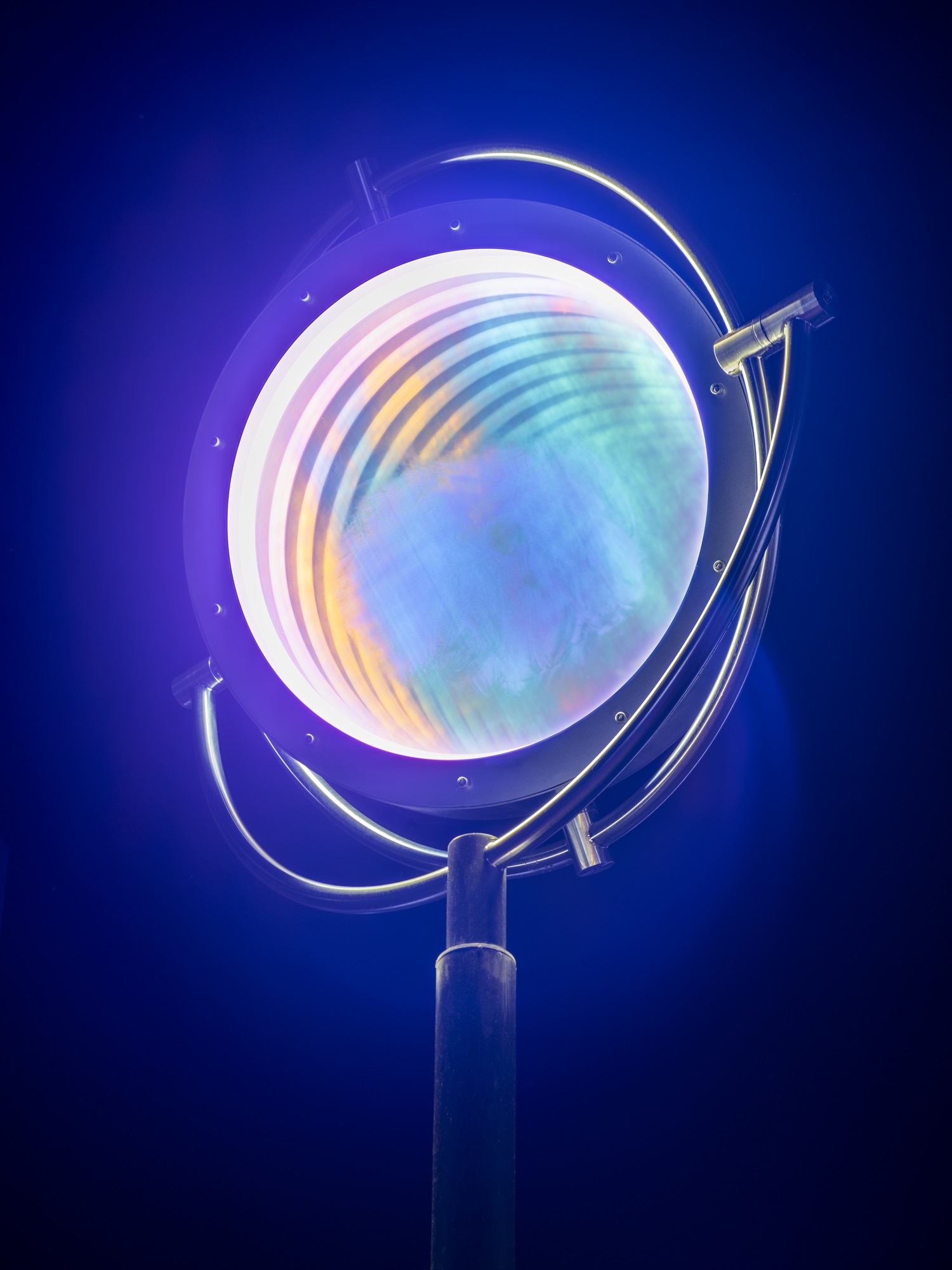 Two semi-transparent mirrors create a lighting element. 